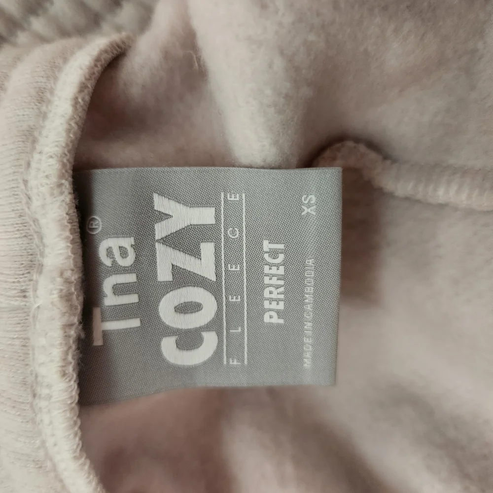 Aritzia TNA Cream Athletic Shorts
